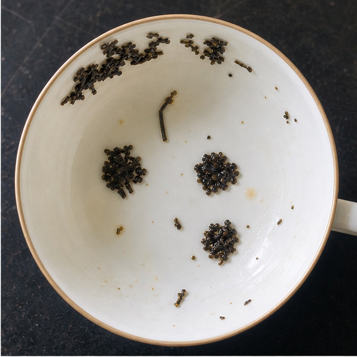 Ace Of Clubs tea leaves cup variation one