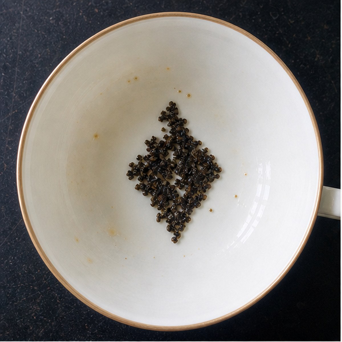 Ace Of Diamonds tea leaf reading cup example