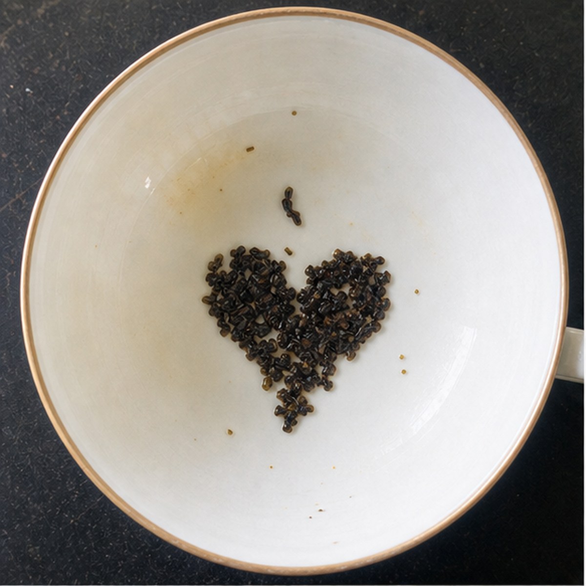 Ace Of Hearts tea leaf reading cup example