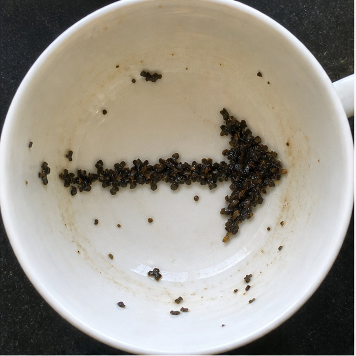 Arrow tea leaf reading cup example