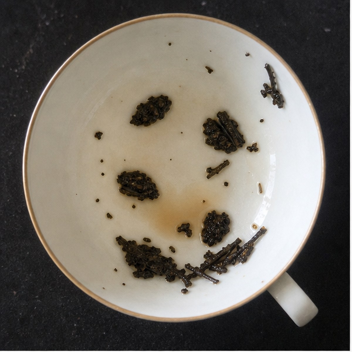 Beans tea leaf reading cup example