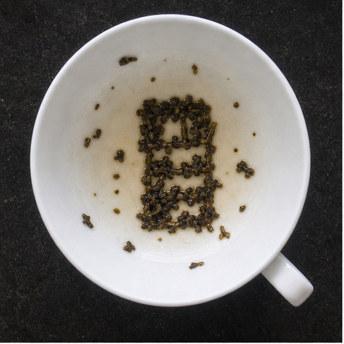 Bookcase tea leaf reading cup example