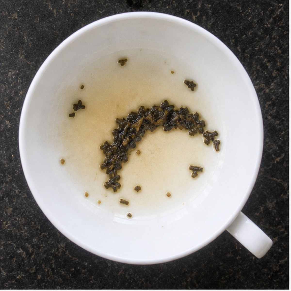 Boomerang tea leaf reading cup example