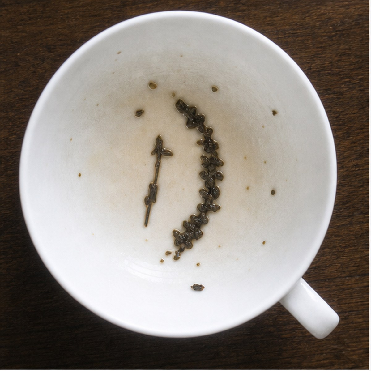 Bow And Arrow tea leaf reading cup example