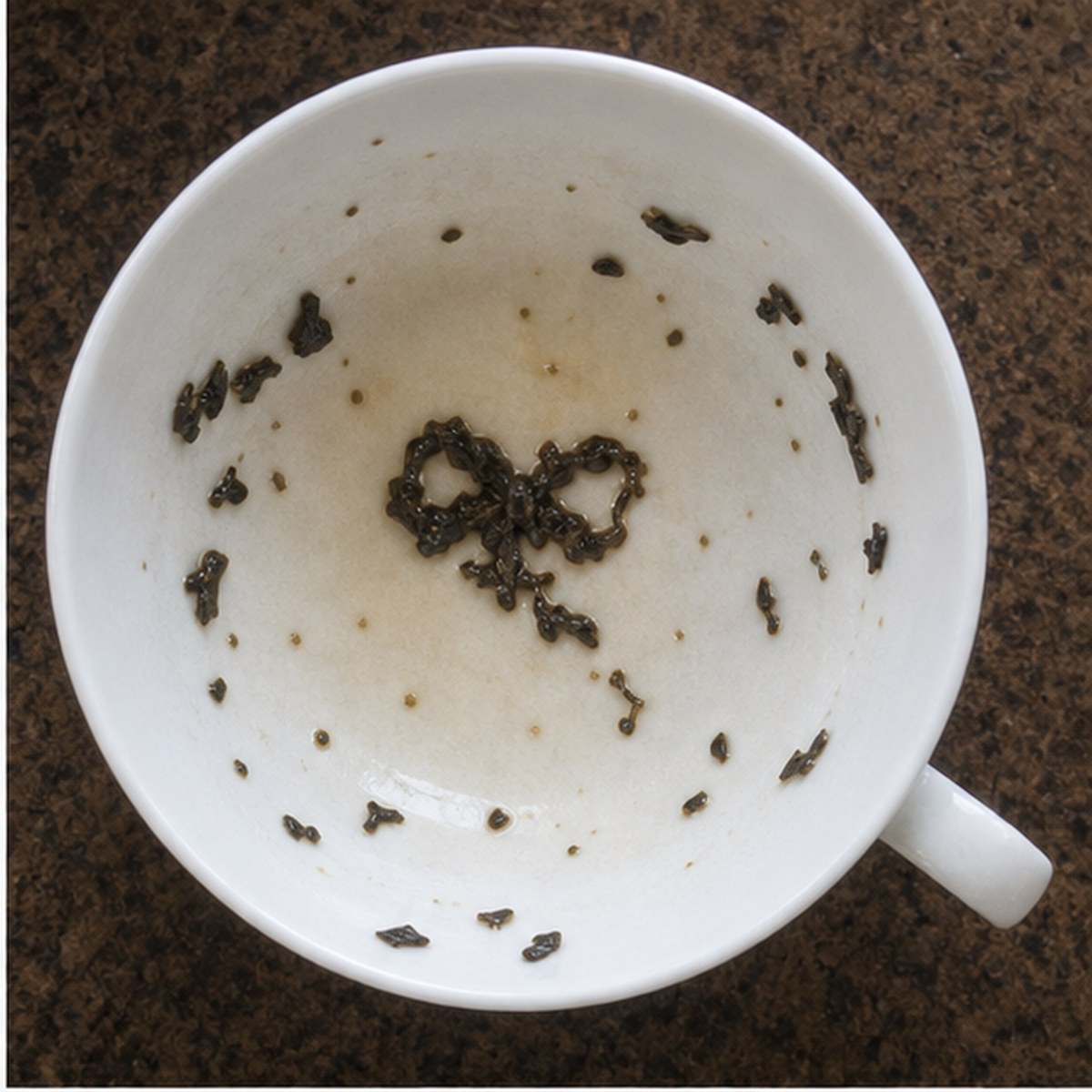Bow tea leaves cup variation one