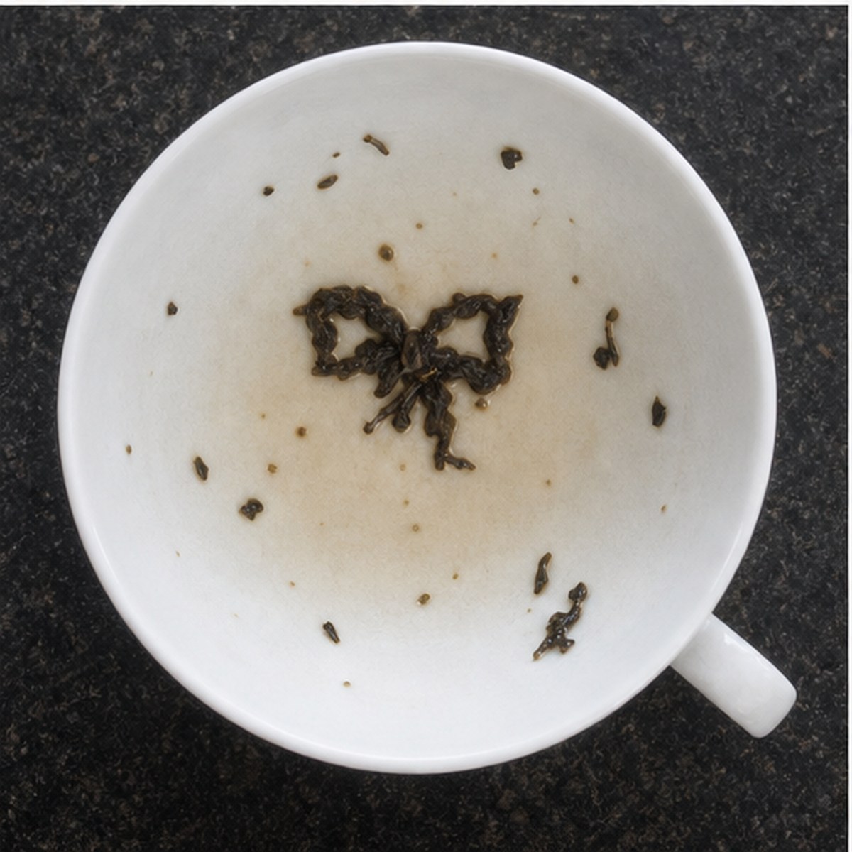 Bow tea leaves cup variation two