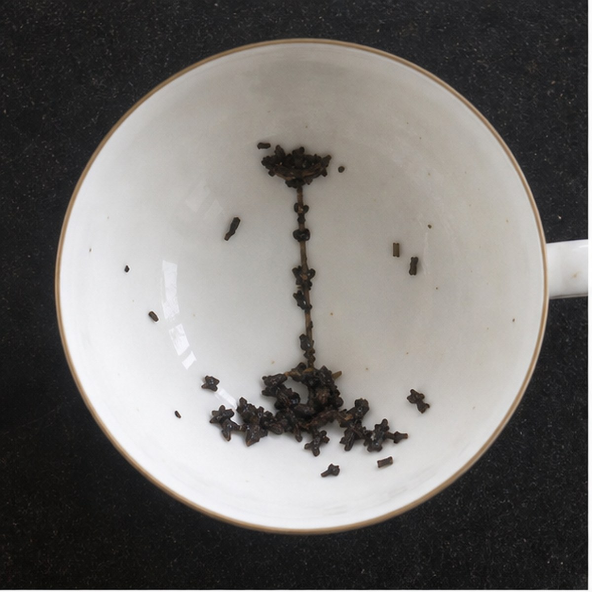 Candlestick tea leaf reading cup example
