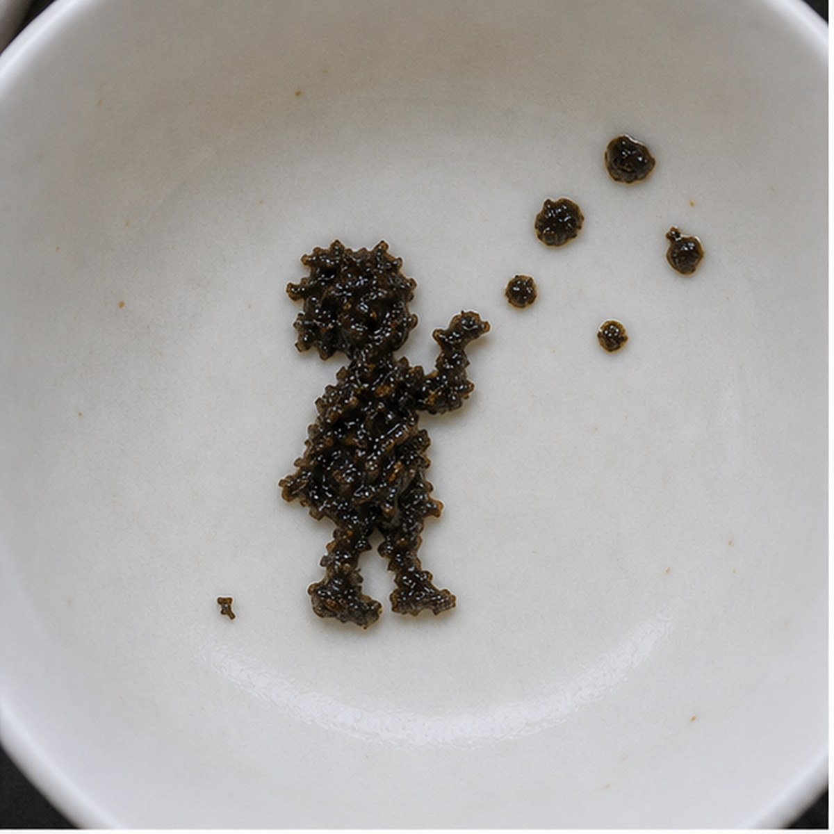 Child Blowing Soap Bubbles tea leaf reading cup example