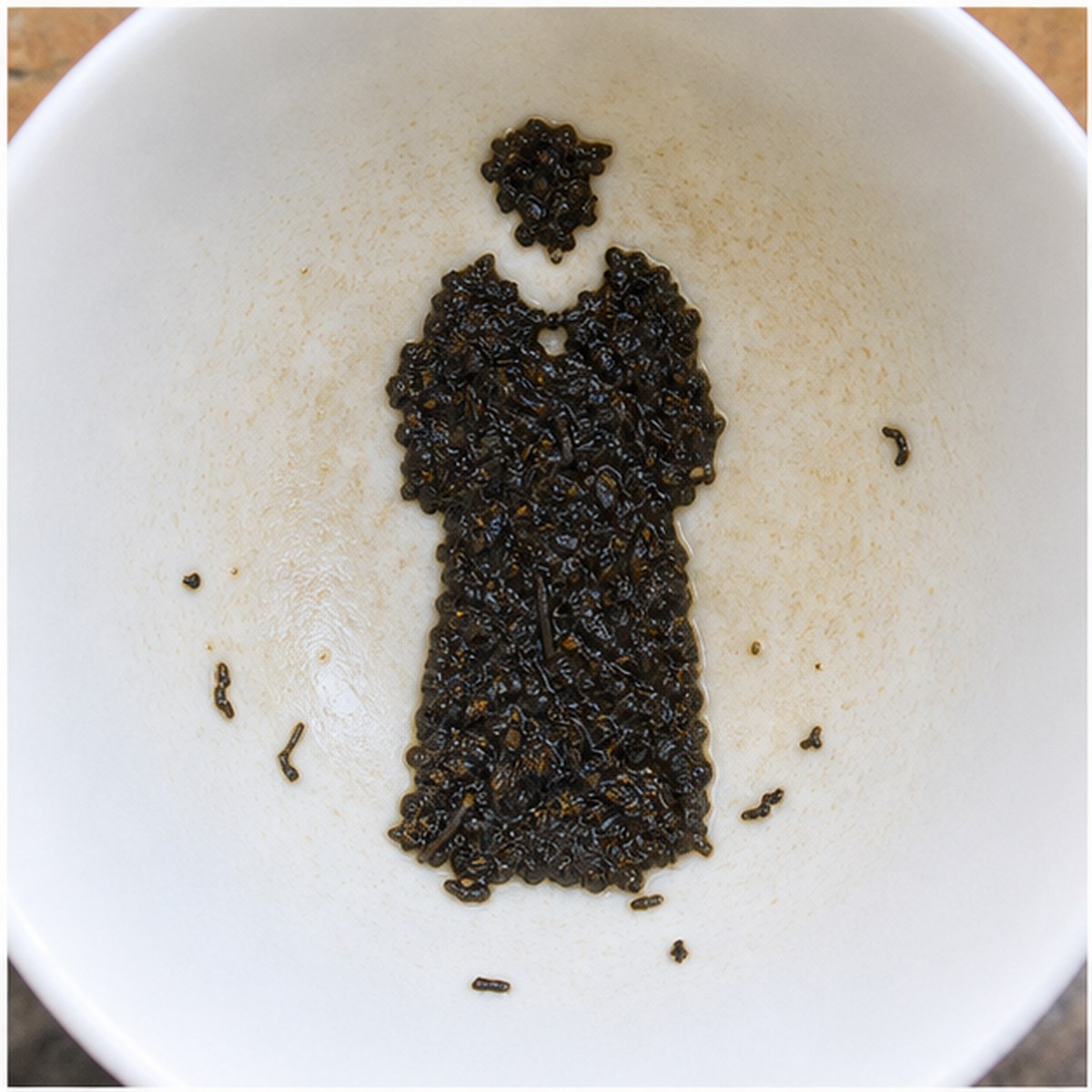 Clergyman tea leaf reading cup example