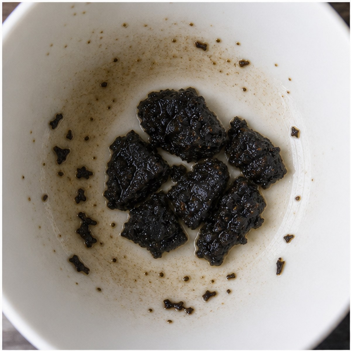 Coal tea leaf reading cup example