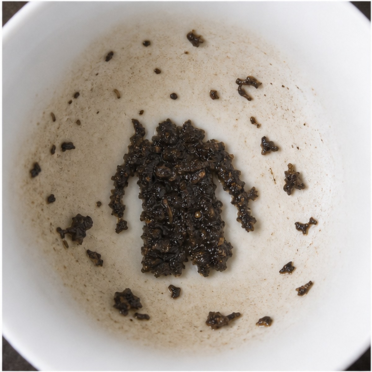 Coat tea leaves cup variation one