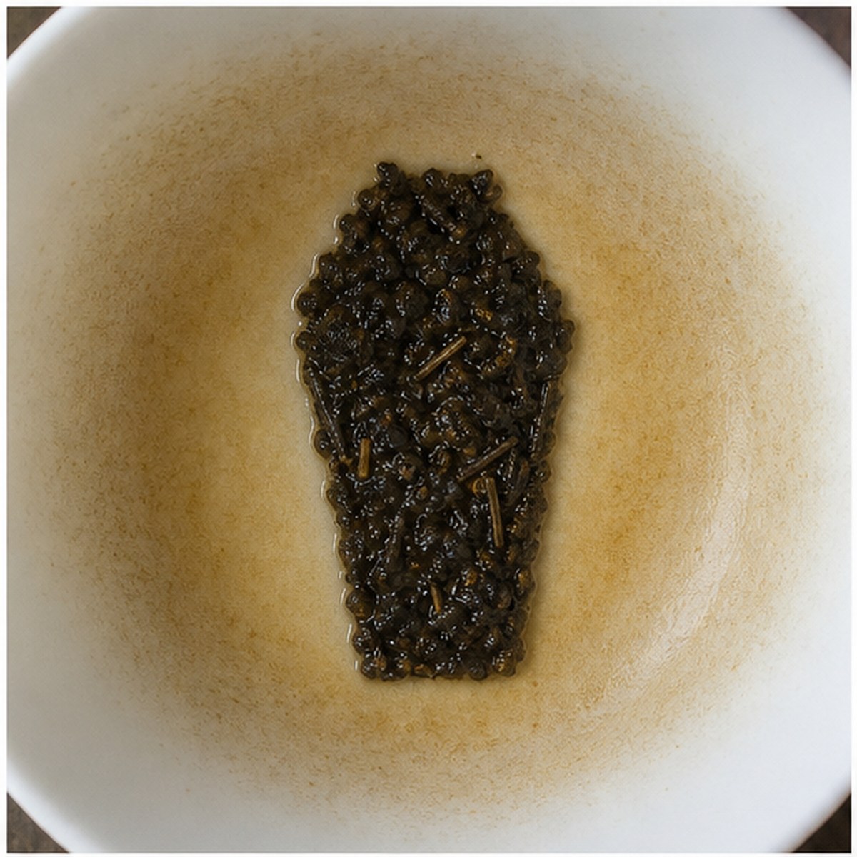 Coffin tea leaf reading cup example