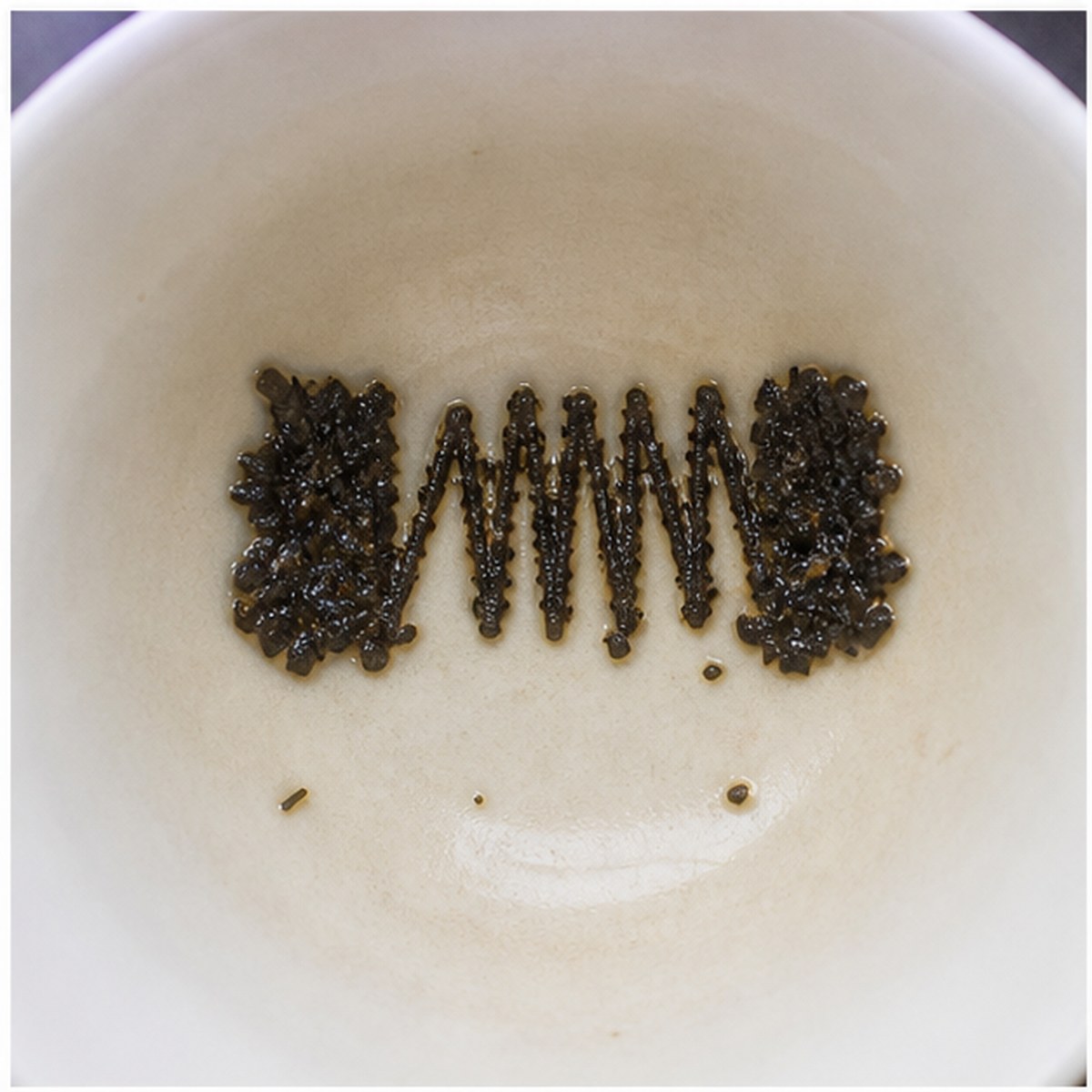 Concertina tea leaf reading cup example