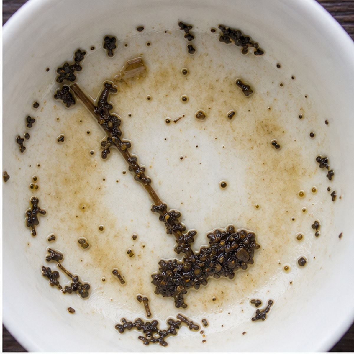 Croquet-Mallet tea leaves cup variation one