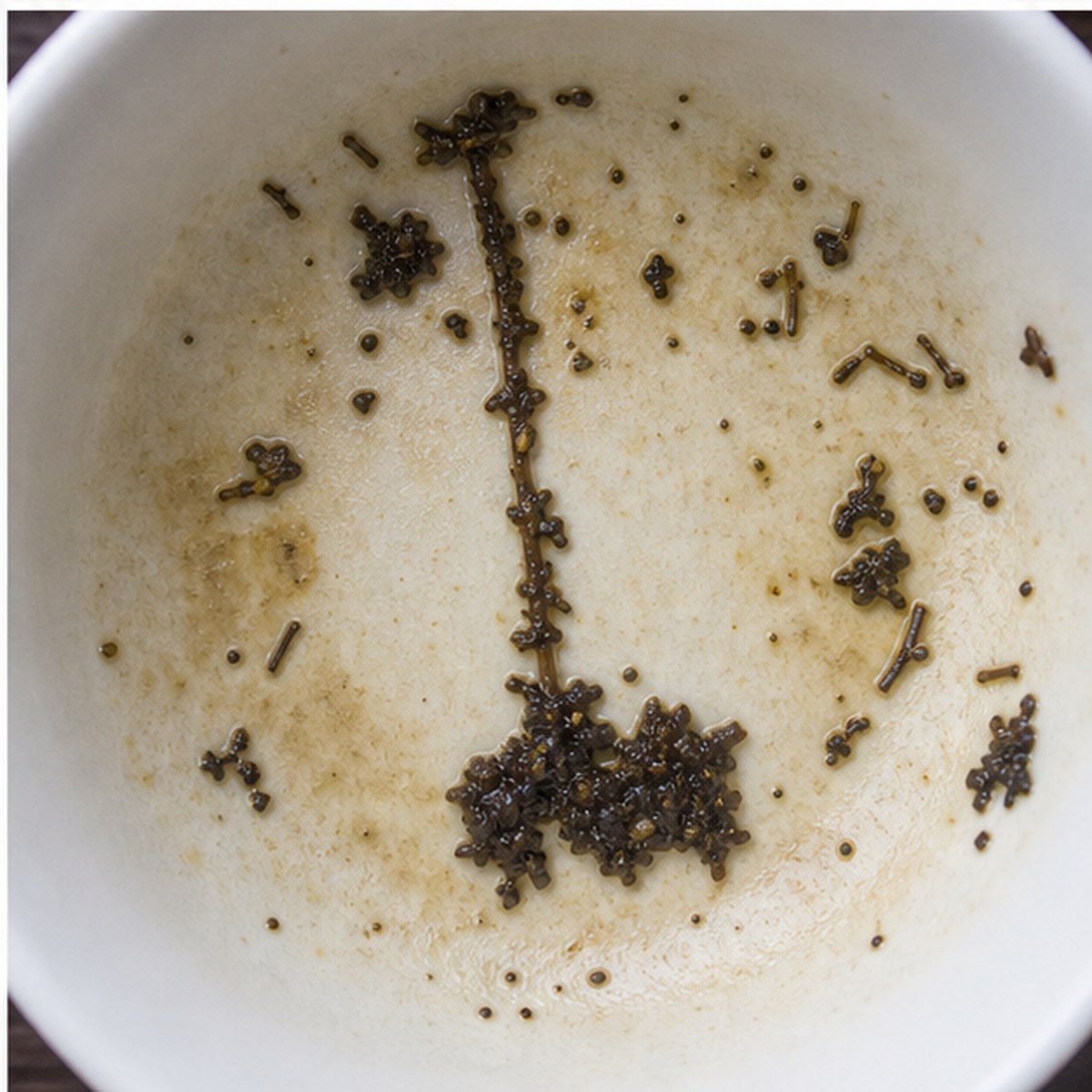 Croquet-Mallet tea leaves cup variation three