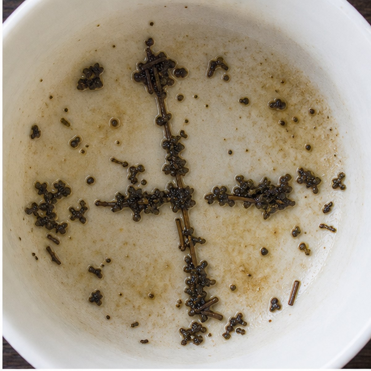 Cross tea leaves cup variation one