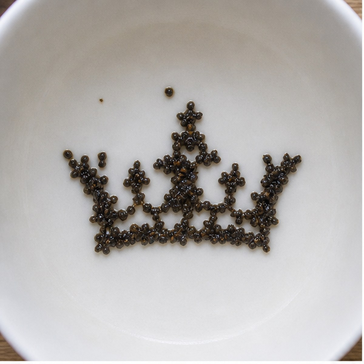 Crown tea leaf reading cup example