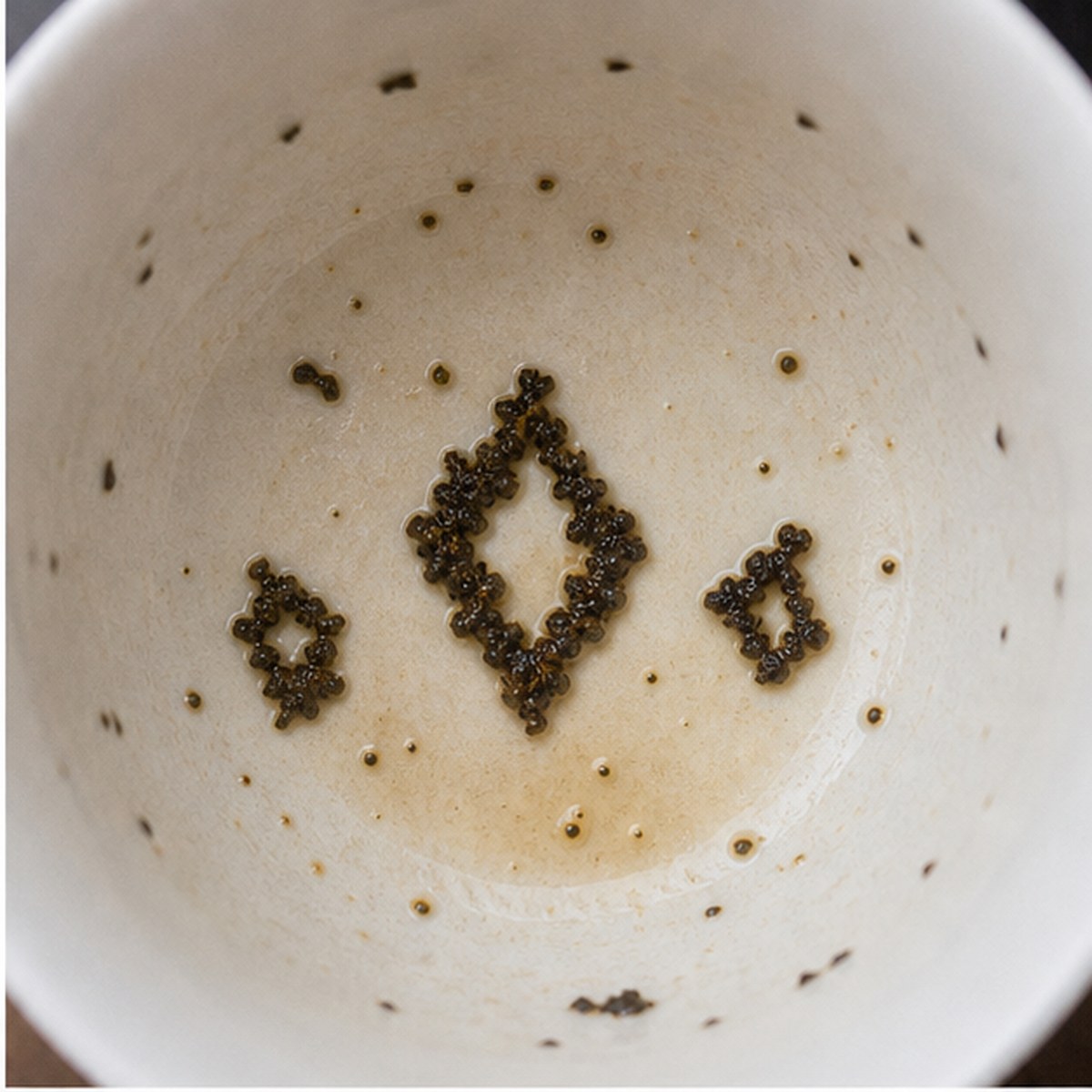 Diamonds tea leaves cup variation one