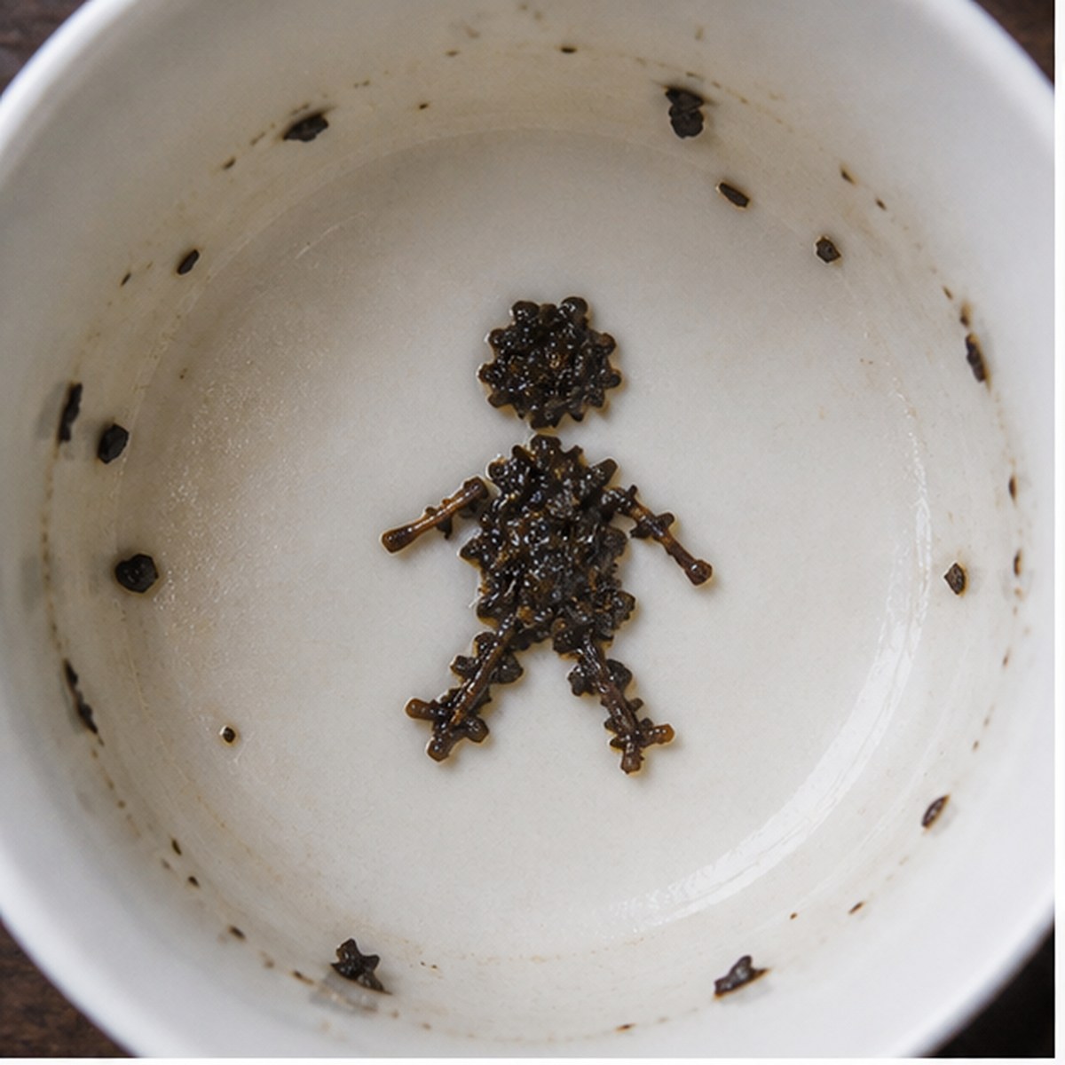 Doll tea leaf reading cup example