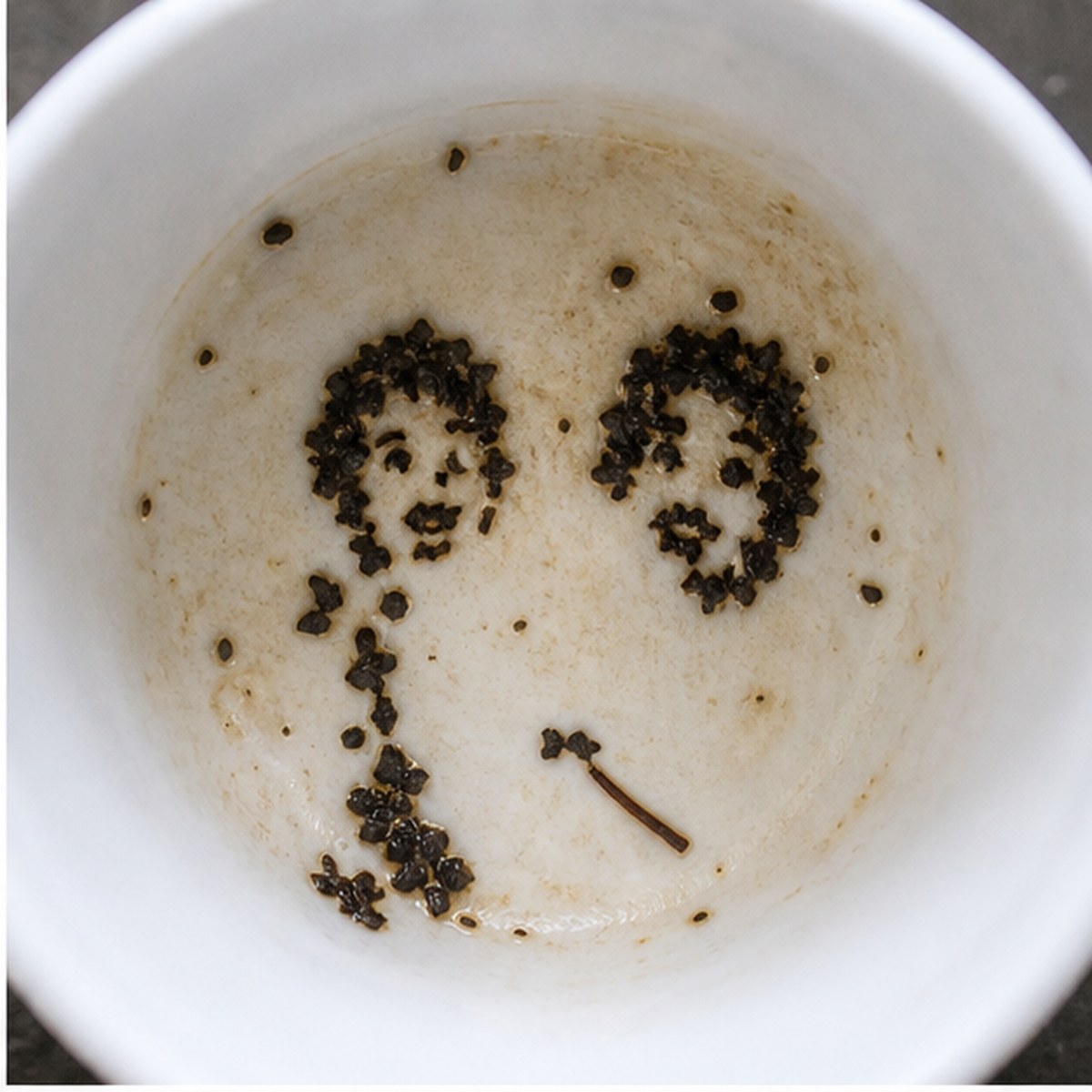 Faces tea leaves cup variation one
