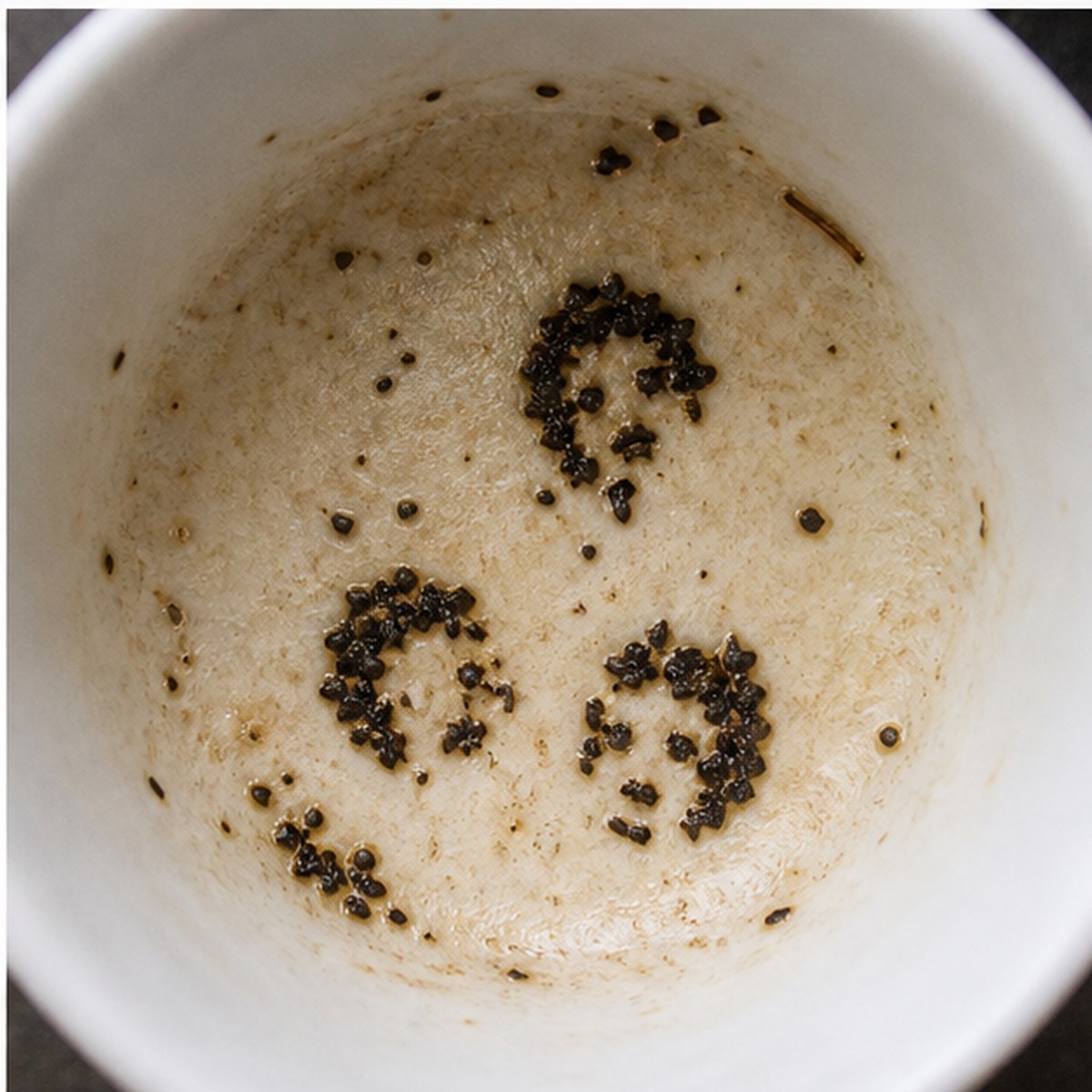 Faces tea leaves cup variation three