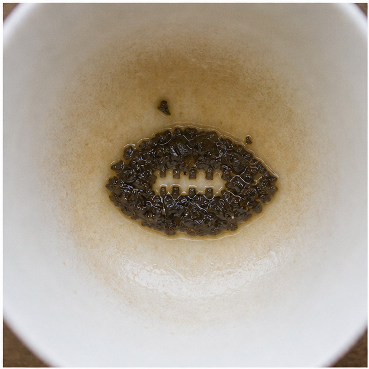Football tea leaf reading cup example