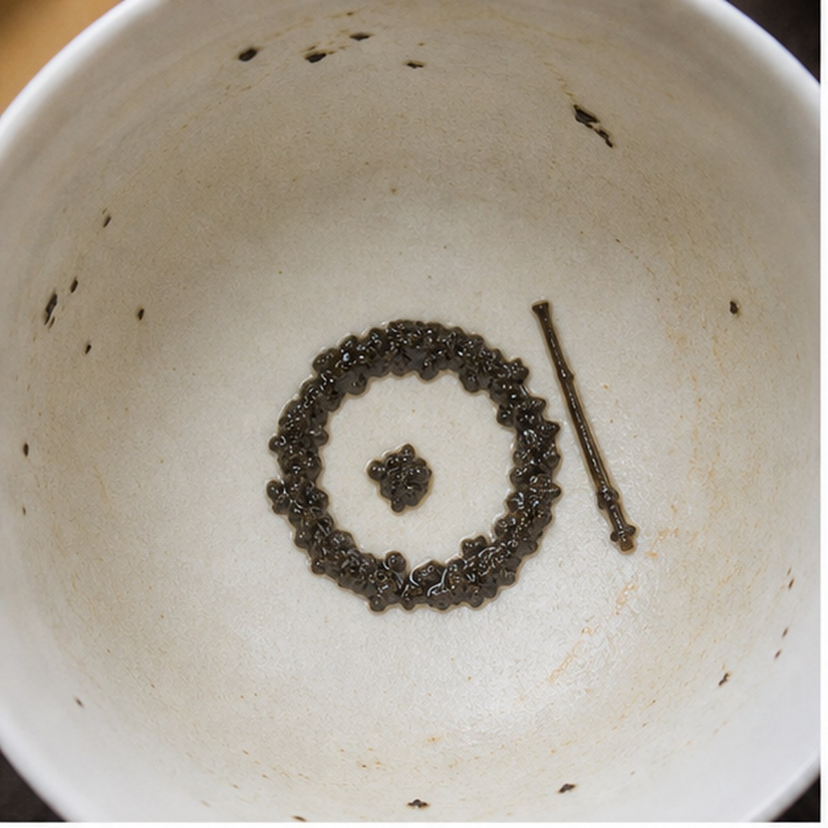 Gong-And-Stick tea leaf reading cup example