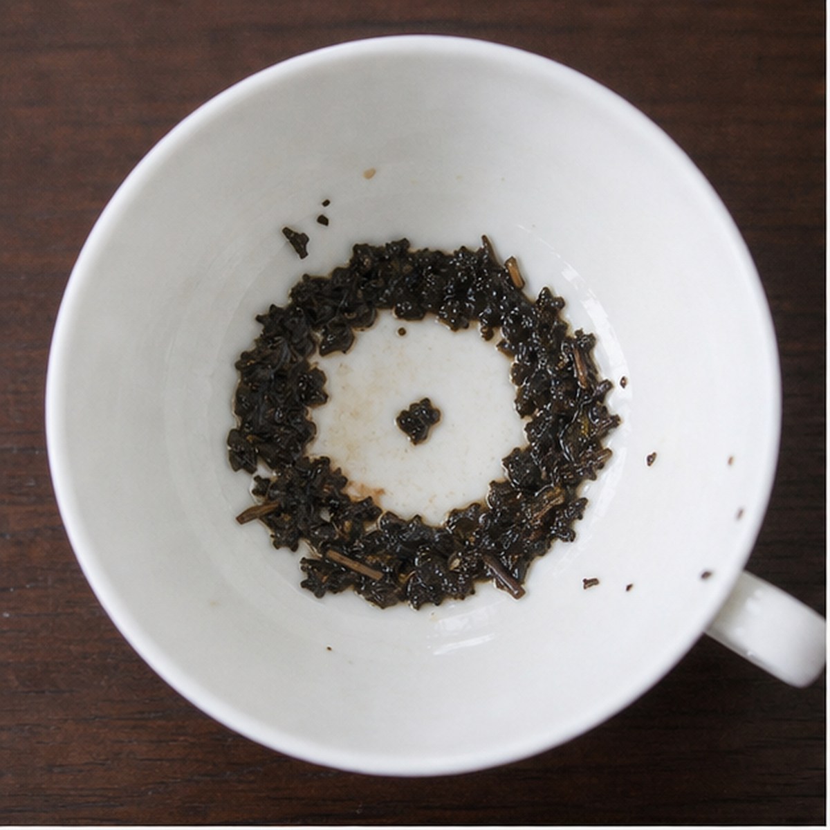 Grindstone tea leaf reading cup example