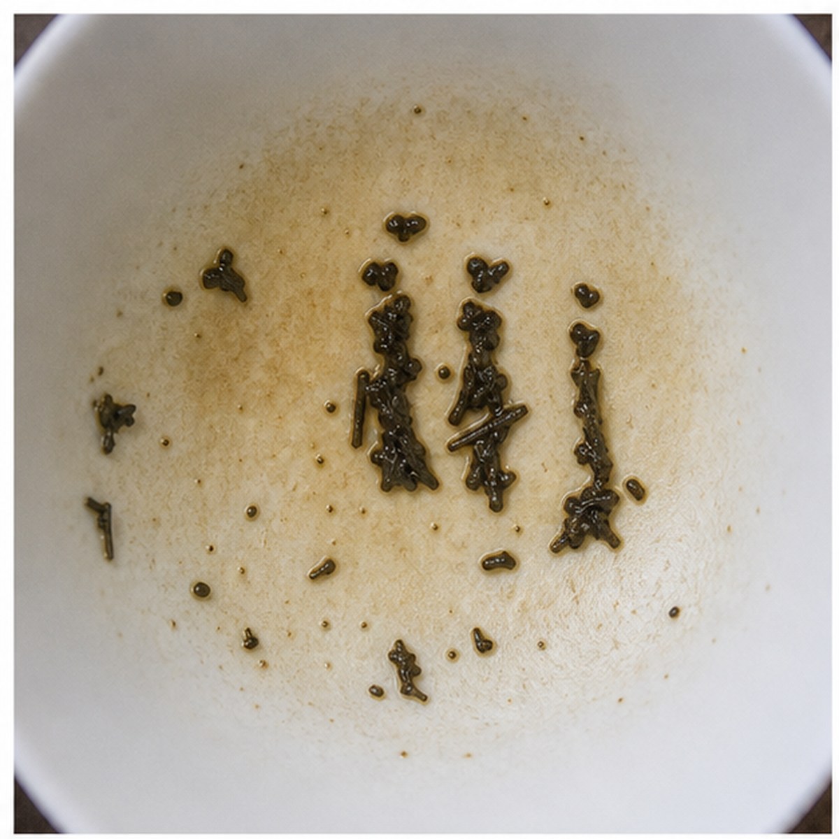 Human Figures tea leaf reading cup example