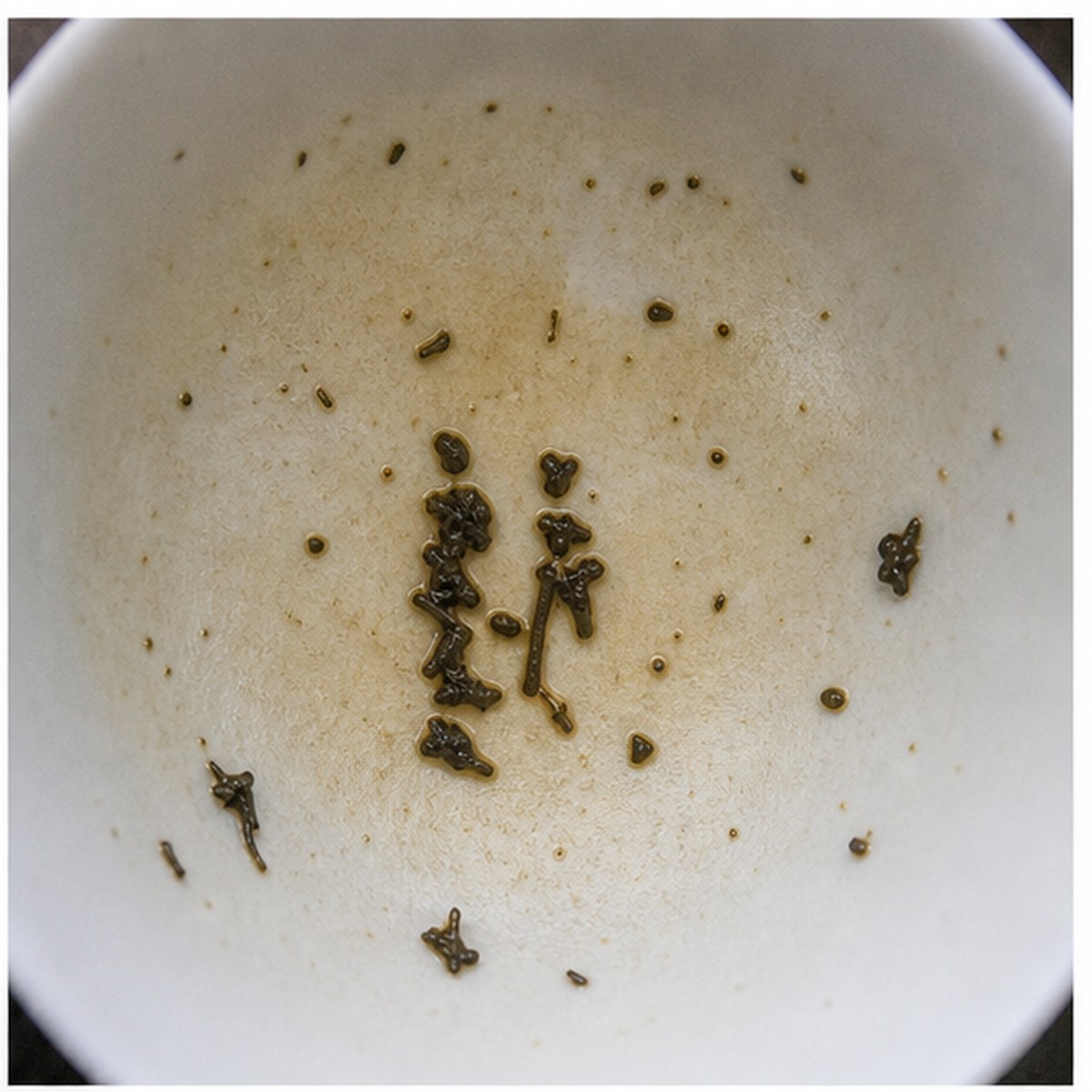 Human Figures tea leaves cup variation one