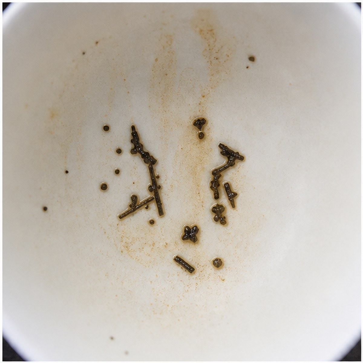 Initials tea leaf reading cup example