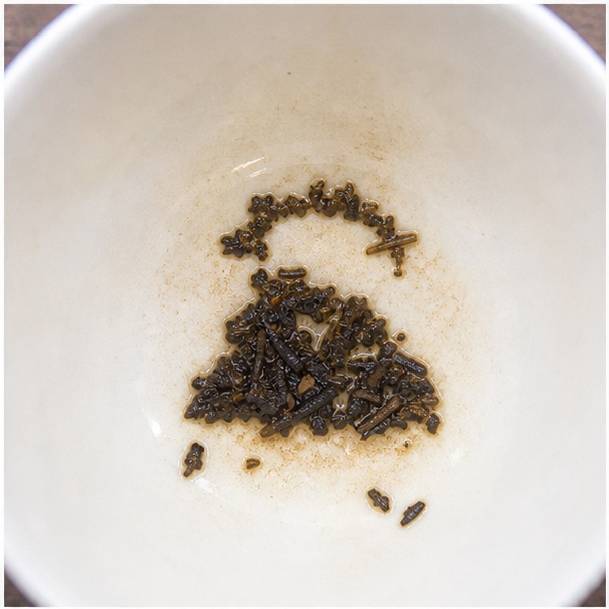 Iron tea leaf reading cup example