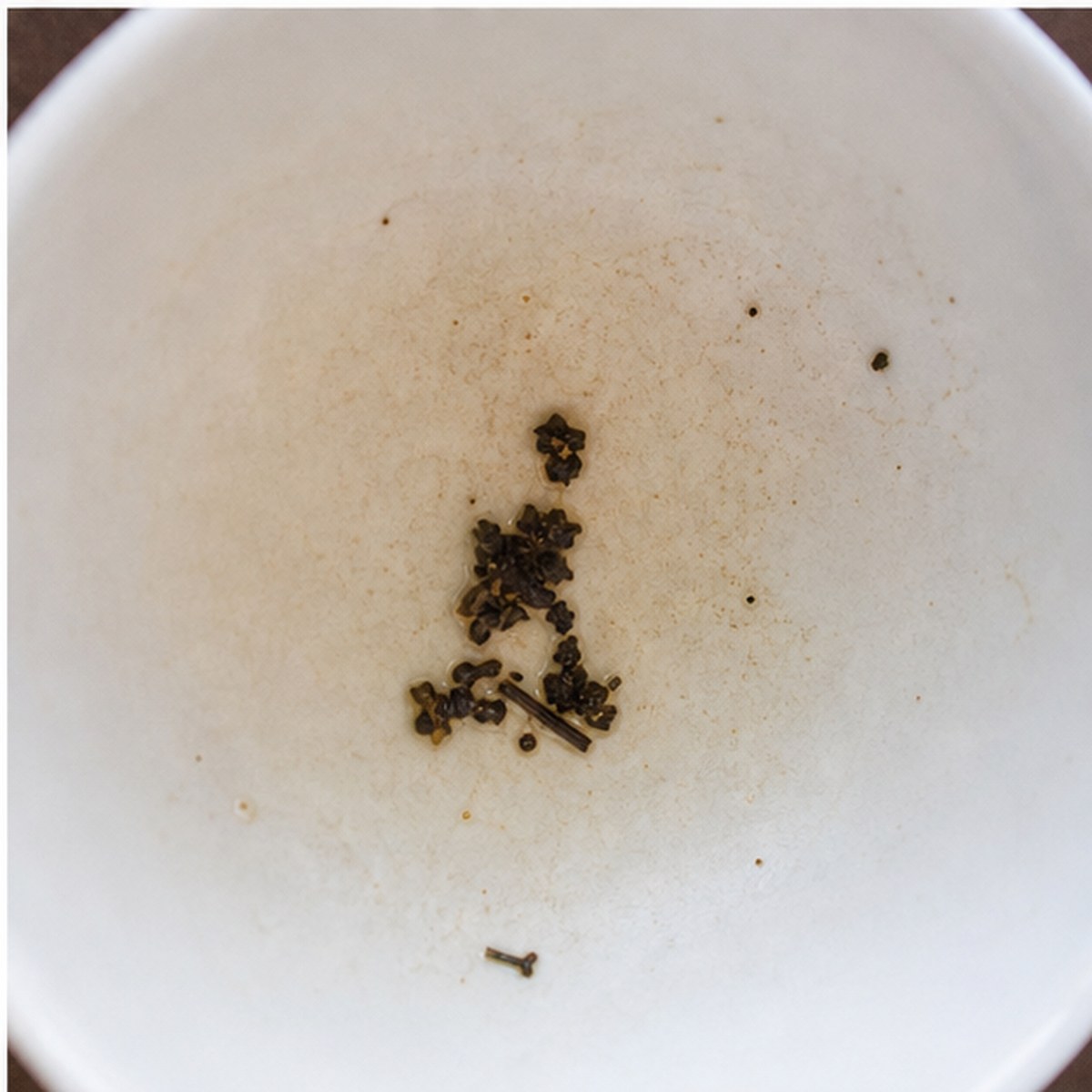 Kneeling Figure tea leaves cup variation three