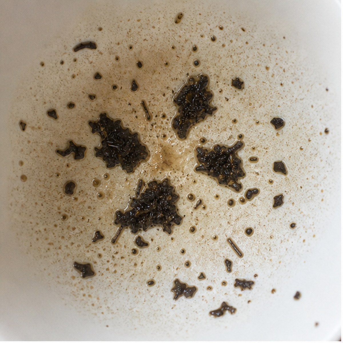 Maltese Cross tea leaf reading cup example