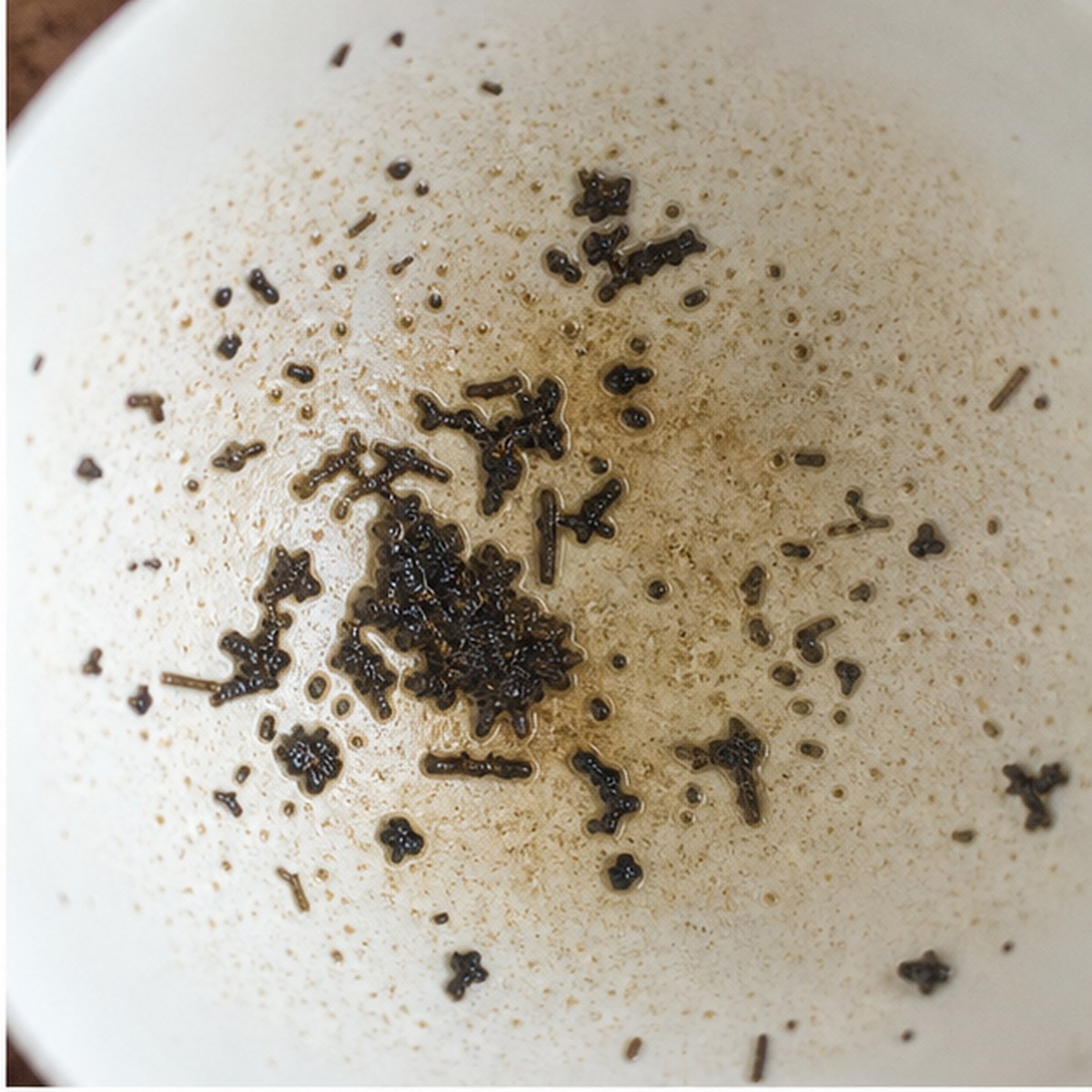 Man Carrying A Burden tea leaves cup variation one