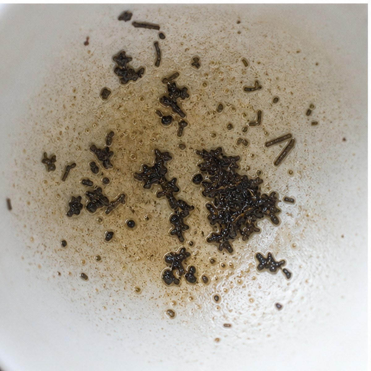 Man Carrying A Burden tea leaves cup variation two