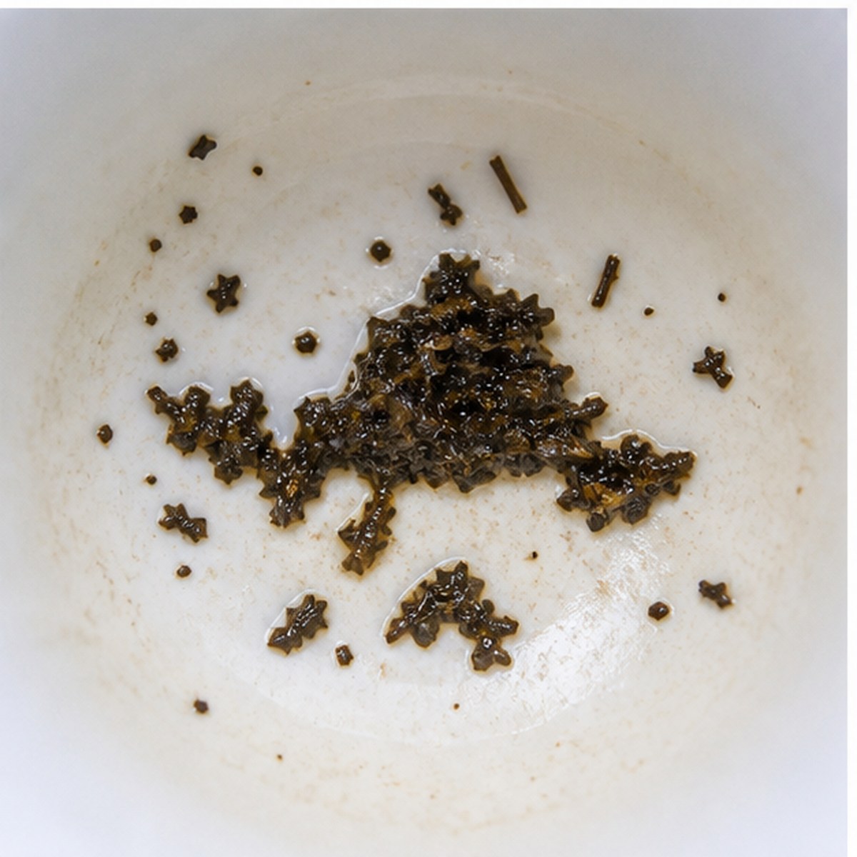 Peaked Cap tea leaves cup variation two