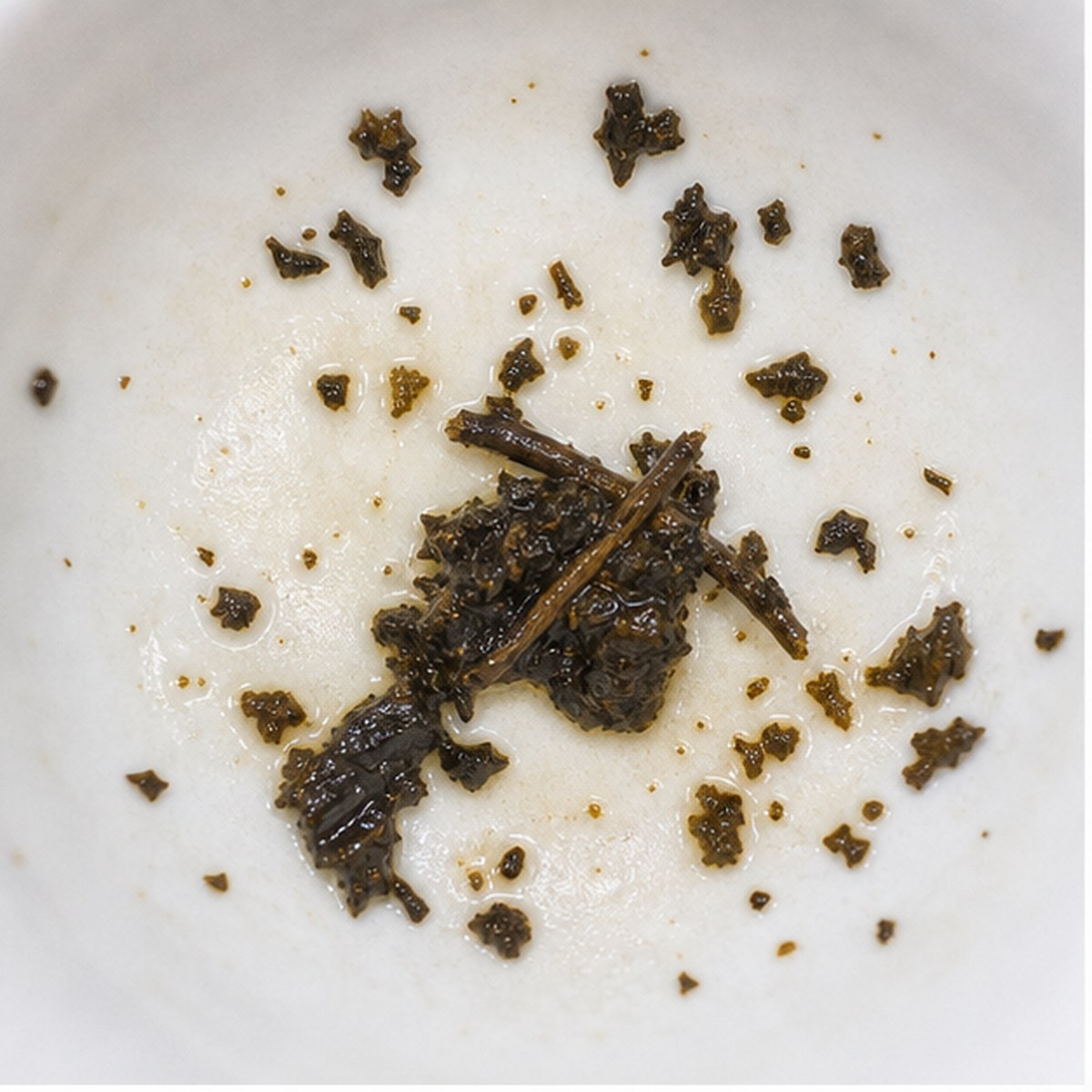 Pickaxe tea leaf reading cup example