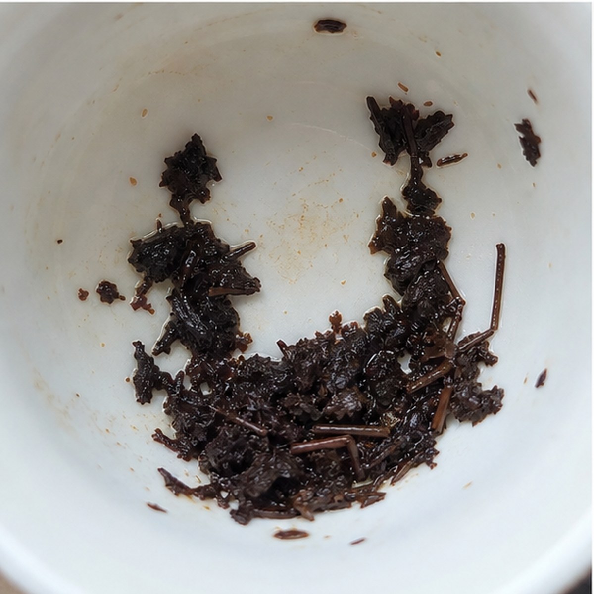 Punch-And-Judy tea leaves cup variation two