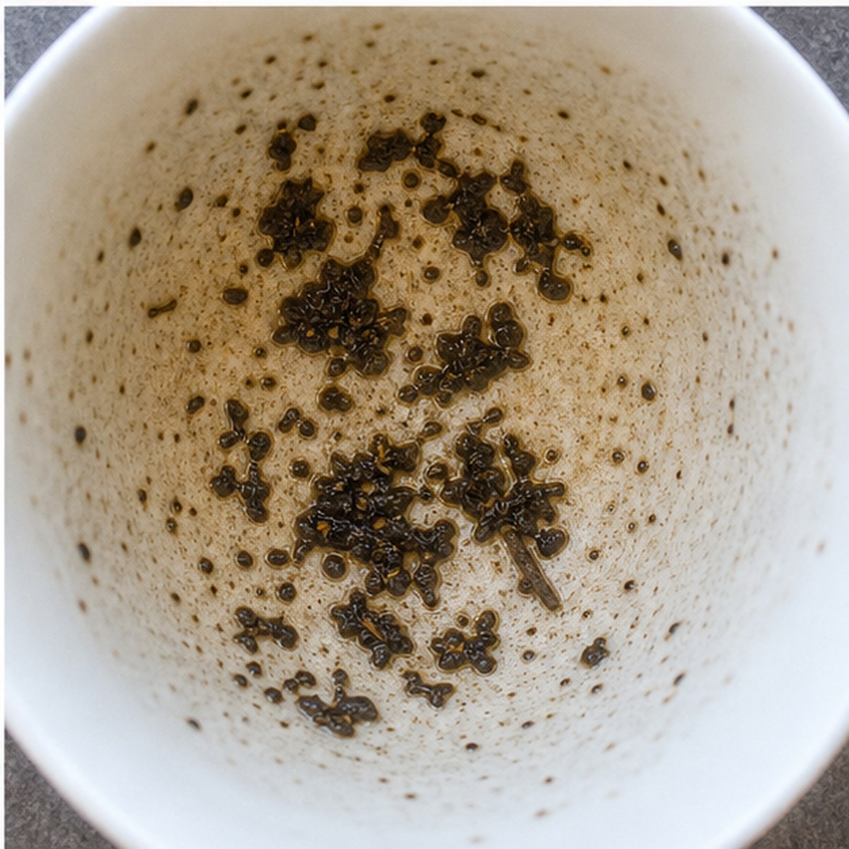 Ugly Faces tea leaves cup variation three